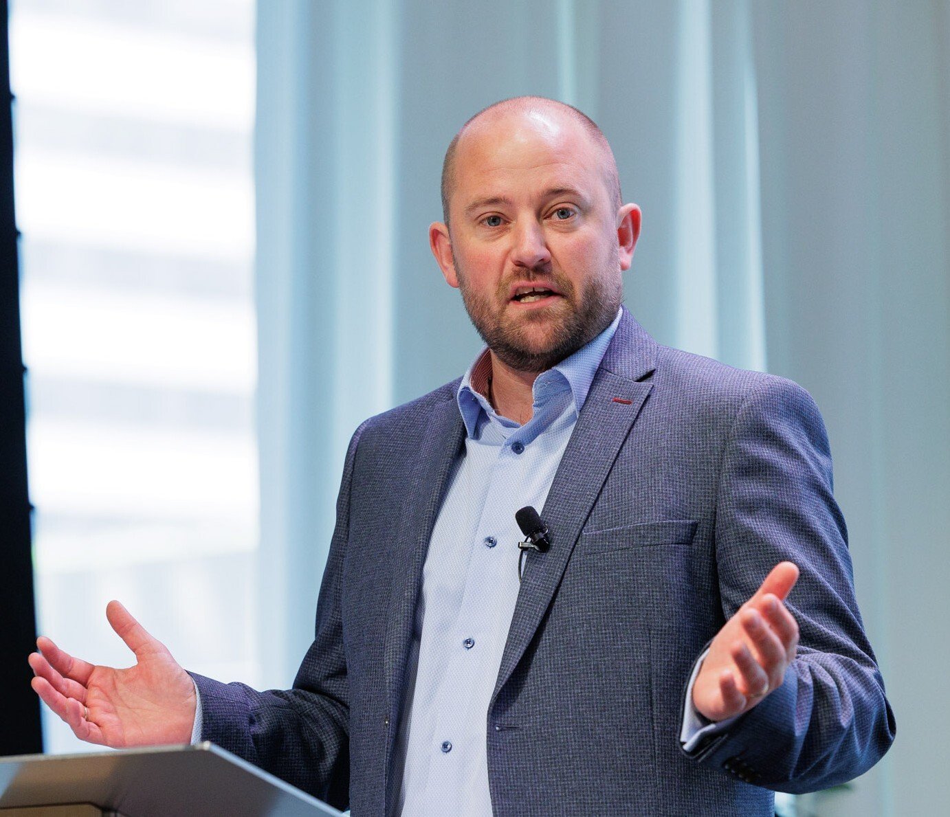 Ross headshot_Eric_Michael_Clarke_SUSTAINABILITY_SUMMIT_1180 (1)-1