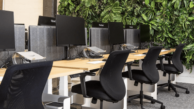 Office chairs in front of computers