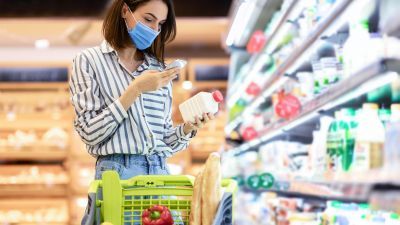 Woman Shopping in Grocery Store