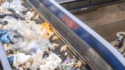 Trash on a conveyer belt in a factory